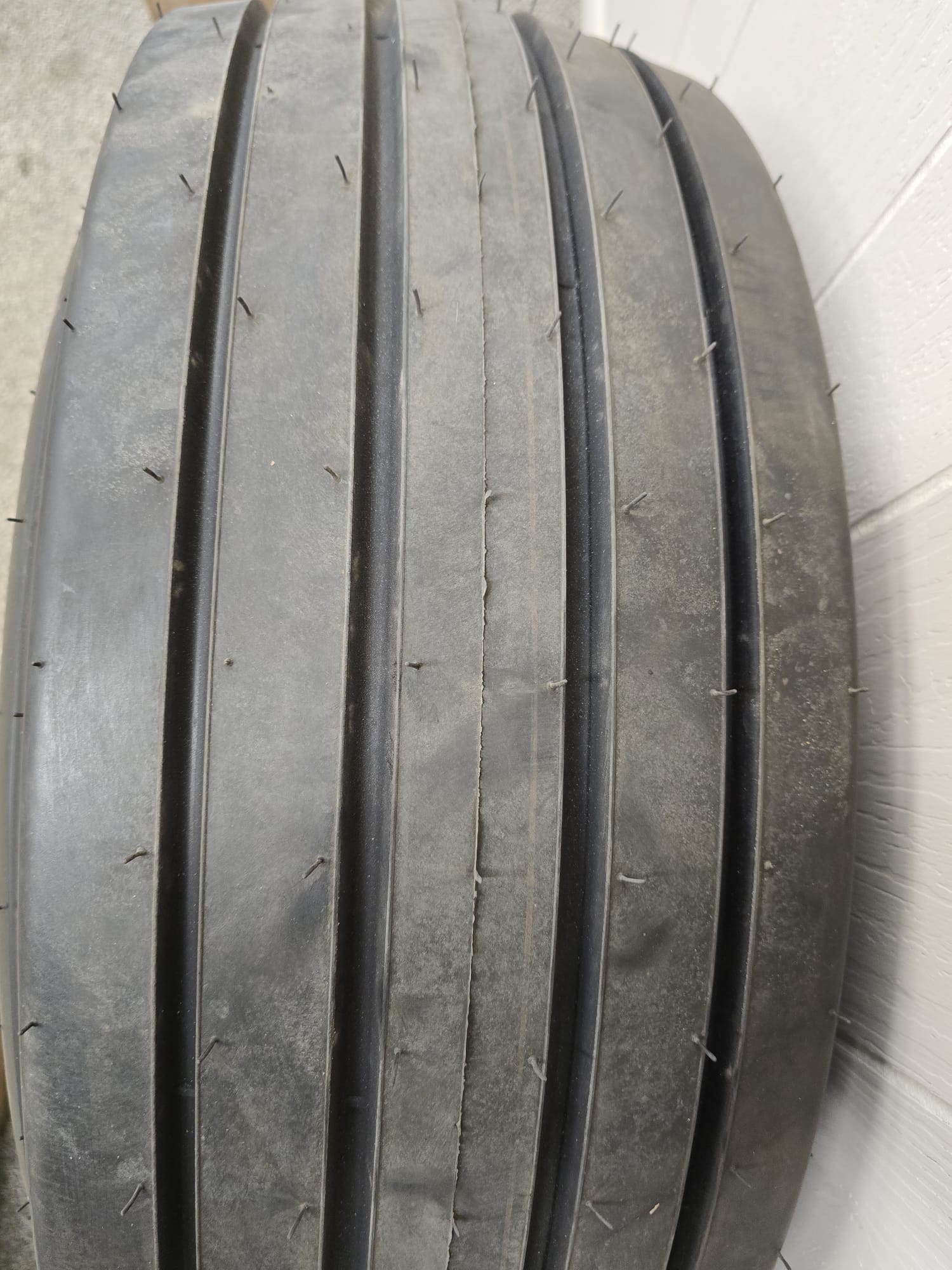 Assembly: 11‑15 F‑Ply Tire on  6‑Hole wheel for high‑speed DOT use . - AG Machinery Depot