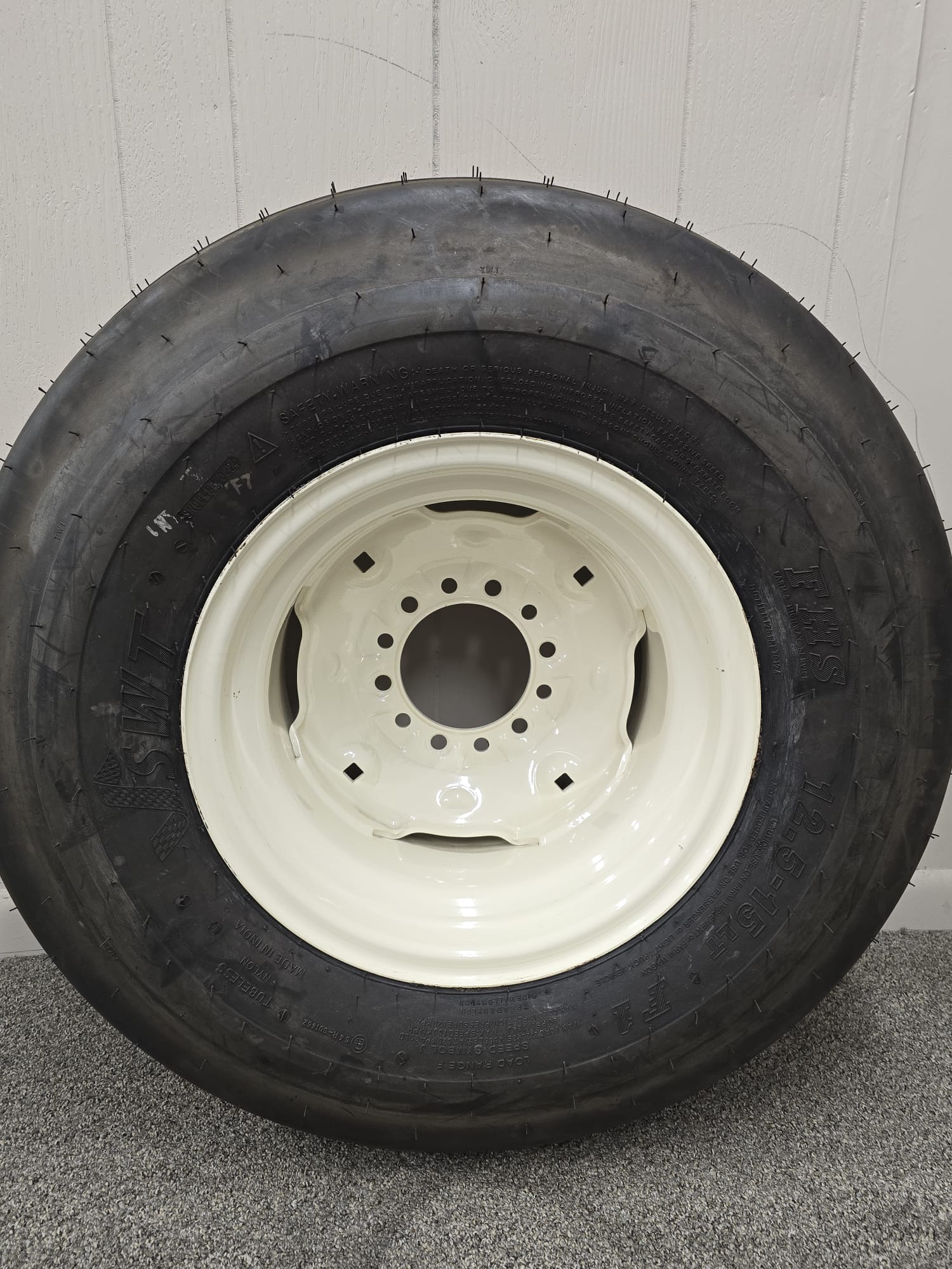 Assembly: 12.5L‑15 F‑Ply Tire on  6‑Hole wheel for high‑speed DOT use . - AG Machinery Depot
