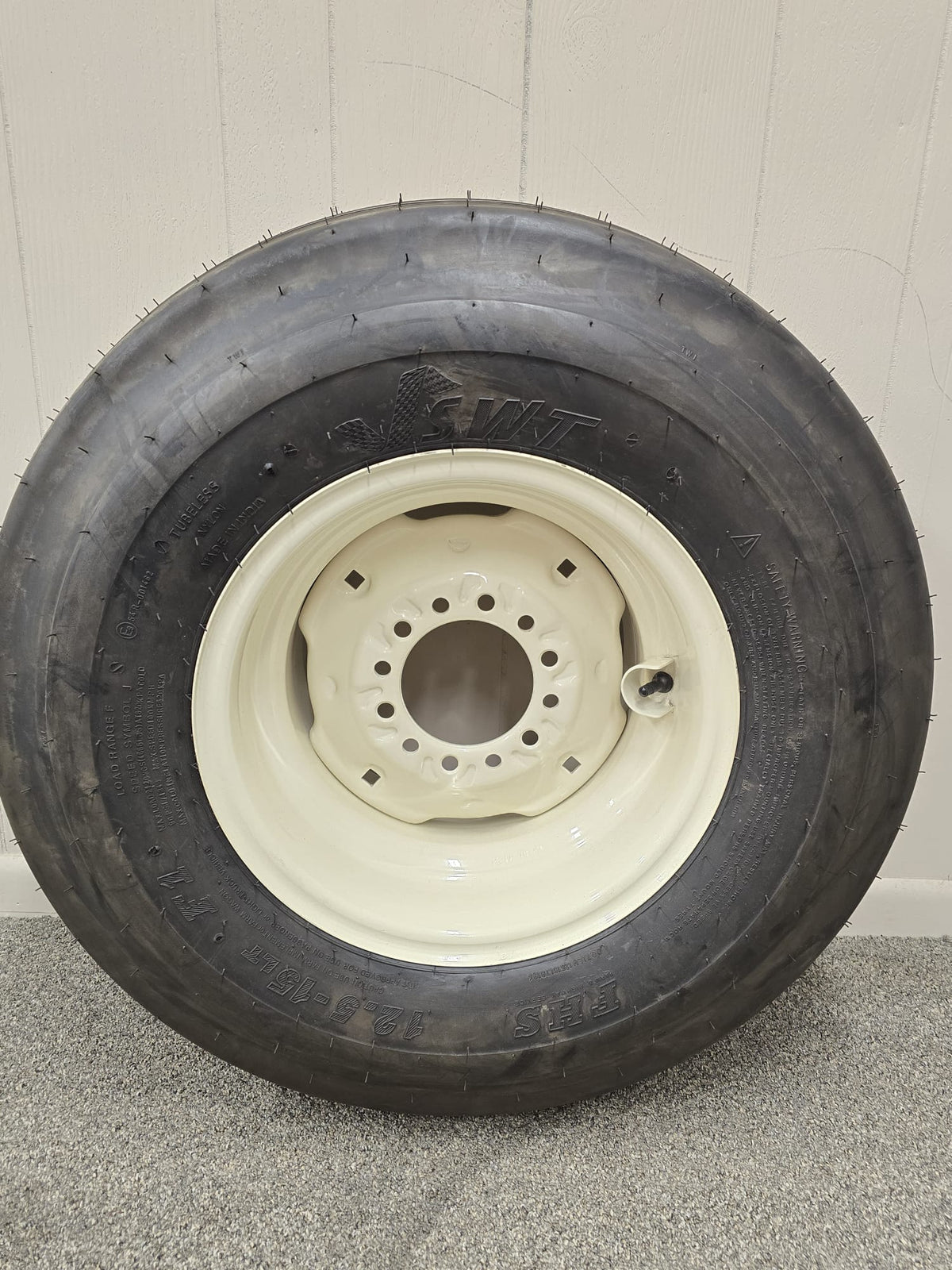 Assembly: 12.5L‑15 F‑Ply Tire on  6‑Hole wheel for high‑speed DOT use . - AG Machinery Depot