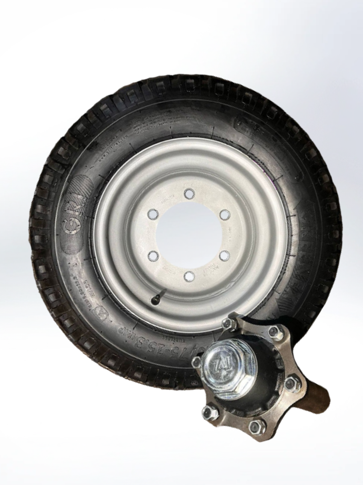 Tire and rim assembly on a white background