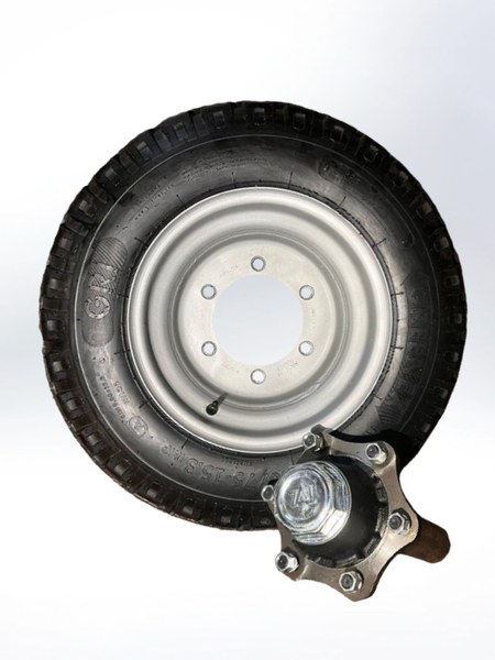 Tire and rim assembly on a white background
