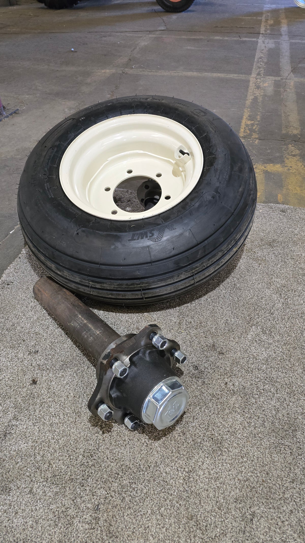 Hub , Spindle, Wheel and Tire Assembly:  Load Capacity 4,320 lb Per Tire: 11L-15, PR - 20, Extra Load, TL Tire, 6 Holes Bundle - AG Machinery Depot