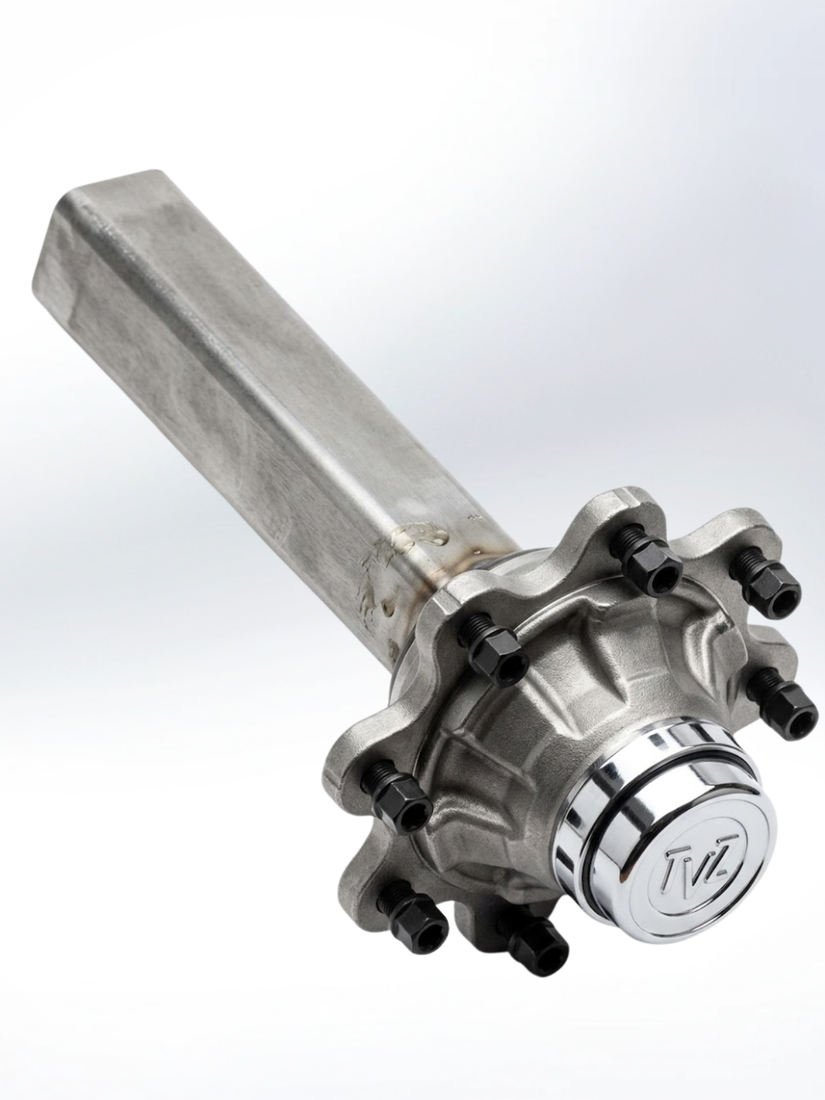 An industrial vehicle component,  axle hub or spindle assembly, featuring a long, square-profiled metal beam attached to a circular hub. The hub is equipped with eight protruding bolts and capped with a polished chrome dust cover embossed with a stylized logo. The entire unit is made of heavy-duty, unpainted steel and is shown against a plain white background.