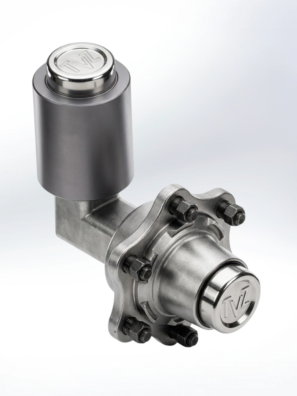 An angled, industrial metal component with a silver-gray finish, featuring a cylindrical vertical section connected to a horizontal hub. The hub is secured with several black bolts and nuts and terminates in a polished silver cap embossed with a stylized "TVZ" logo.